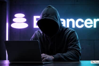 A hooded hacker figure operating a laptop in front of a glowing Balancer logo