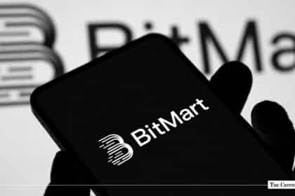 Close-up of a smartphone screen with the white BitMart logo on a dark background