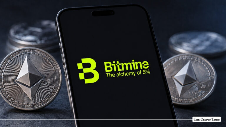 Black smartphone screen displaying the green Bitmine logo and slogan "The alchemy of 5%" surrounded by physical Ethereum coins