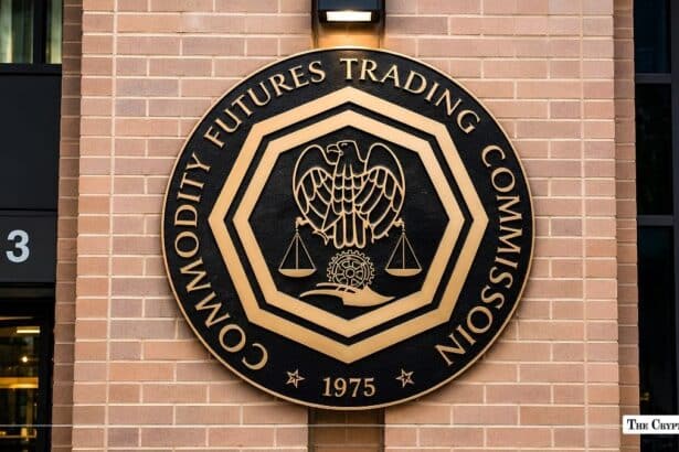 Gold and black Commodity Futures Trading Commission (CFTC) seal mounted on a brick building wall