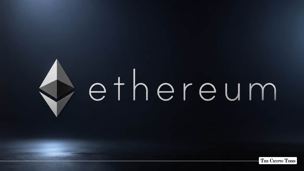 Silver Ethereum logo and lowercase text lit by a soft spotlight on a dark metallic surface