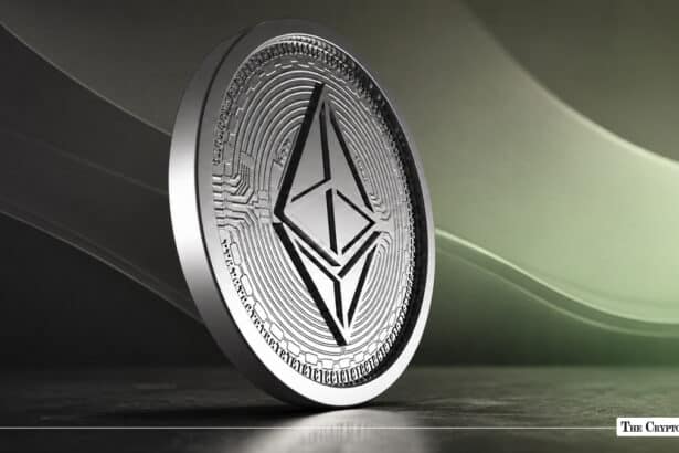 A Ethereum coin standing on a dark surface against a soft-lit background