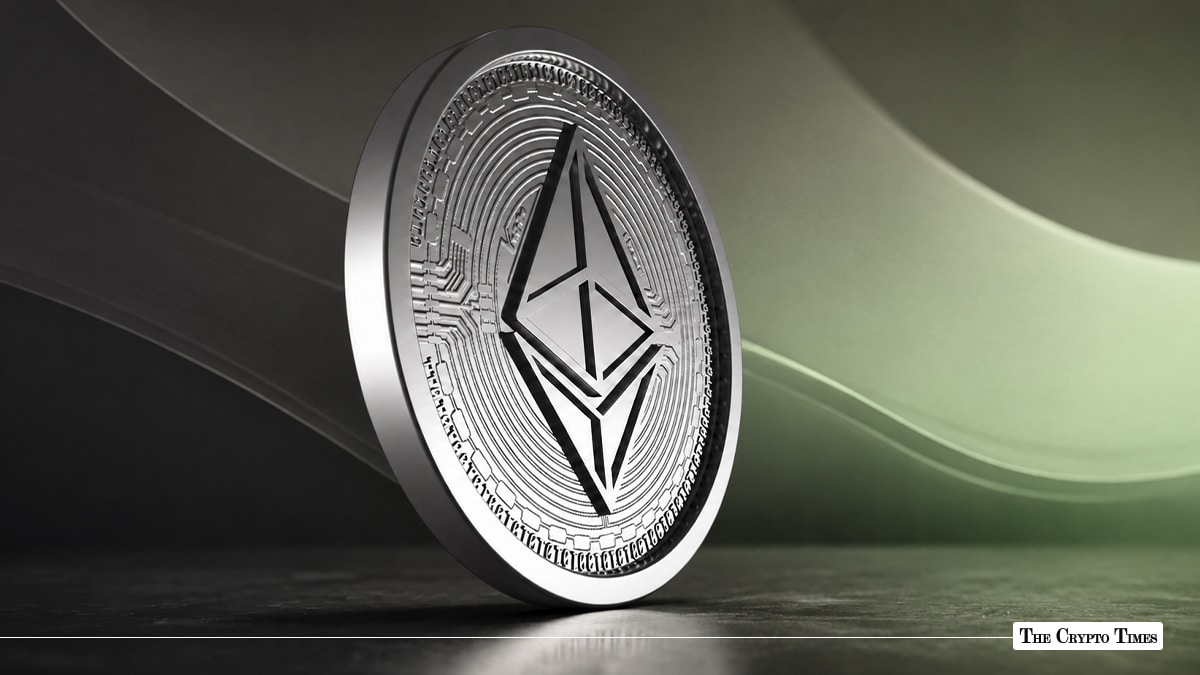 A Ethereum coin standing on a dark surface against a soft-lit background