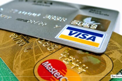 Visa and Mastercard credit cards stacked together.