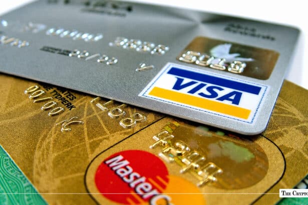 Visa and Mastercard credit cards stacked together.