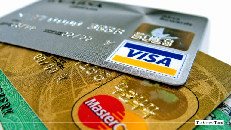 Visa and Mastercard credit cards stacked together.