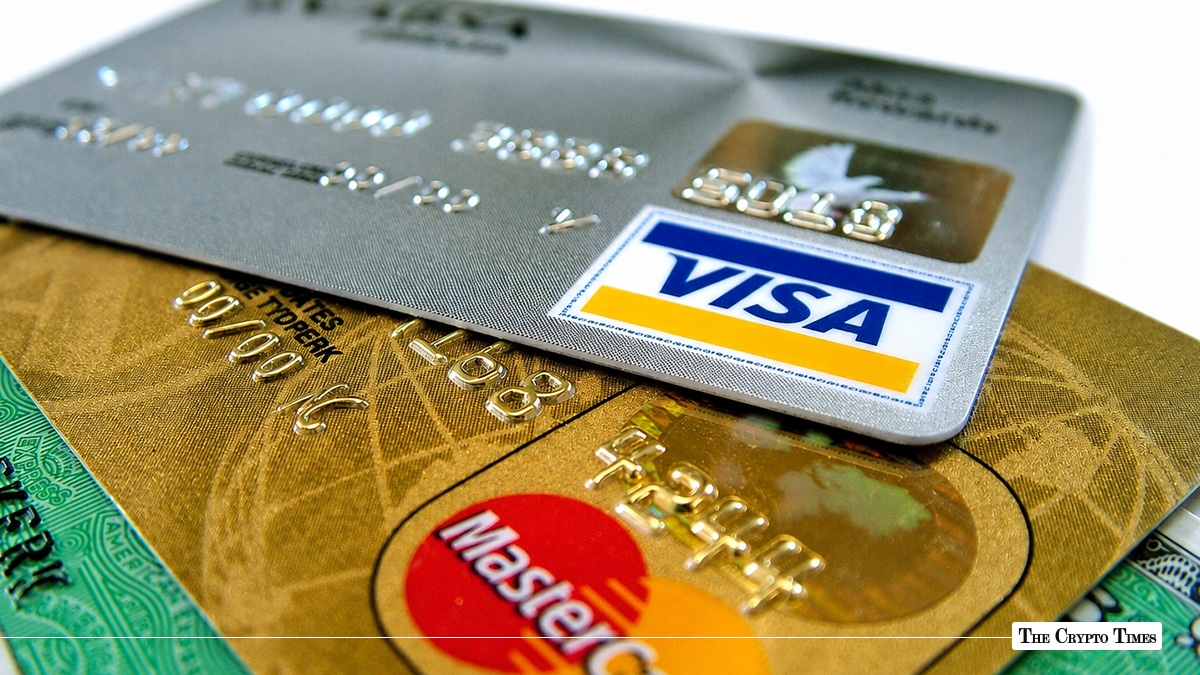 Visa and Mastercard credit cards stacked together.