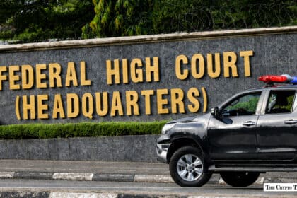 Federal High Court headquarters in Abuja with police vehicle