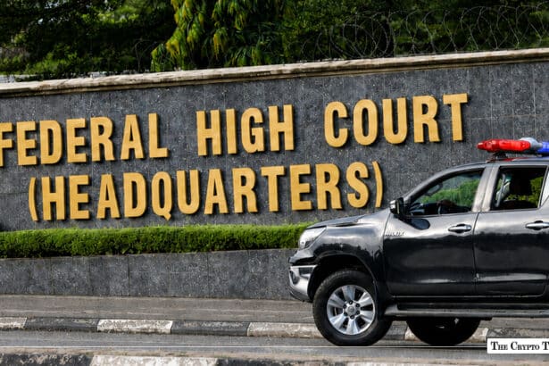 Federal High Court headquarters in Abuja with police vehicle