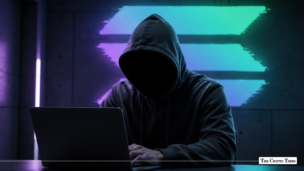 A hooded figure using a laptop in front of a glowing, multicolored Solana logo
