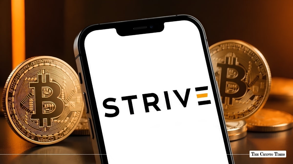 Smartphone screen displaying the Strive logo flanked by shiny physical Bitcoin coins on a dark surface