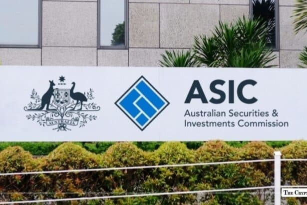 Large white outdoor sign displaying the Australian Securities & Investments Commission (ASIC) logo and text in front of a modern building facade