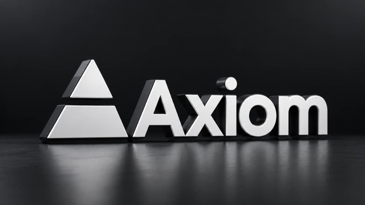 Axiom logo with silver geometric pyramid icon on matte black surface