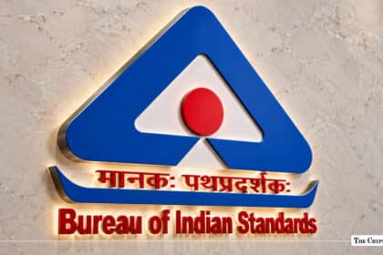An illuminated wall logo of the Bureau of Indian Standards with Hindi and English text
