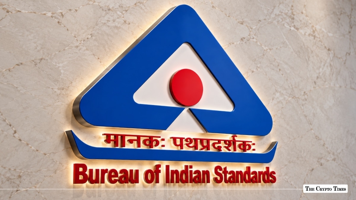 An illuminated wall logo of the Bureau of Indian Standards with Hindi and English text