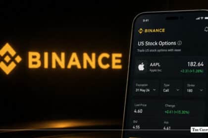 Smartphone showing Binance's AAPL stock options interface next to a glowing Binance logo