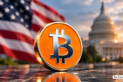 Gold and orange Bitcoin coin in front of the US Capitol Building and American flag.