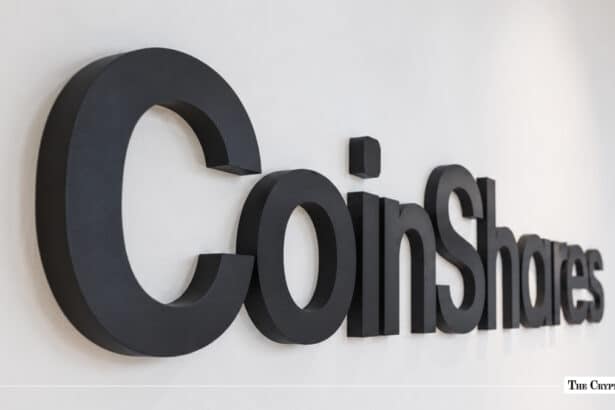 CoinShares logo displayed in black on a white wall.
