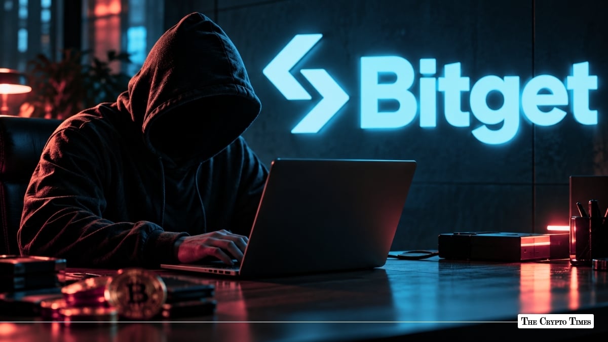 Hooded hacker typing on a laptop in front of a glowing Bitget exchange logo