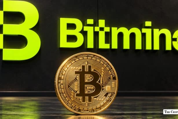 A gold Bitcoin coin in front of an illuminated lime green Bitmine logo on a dark wall.
