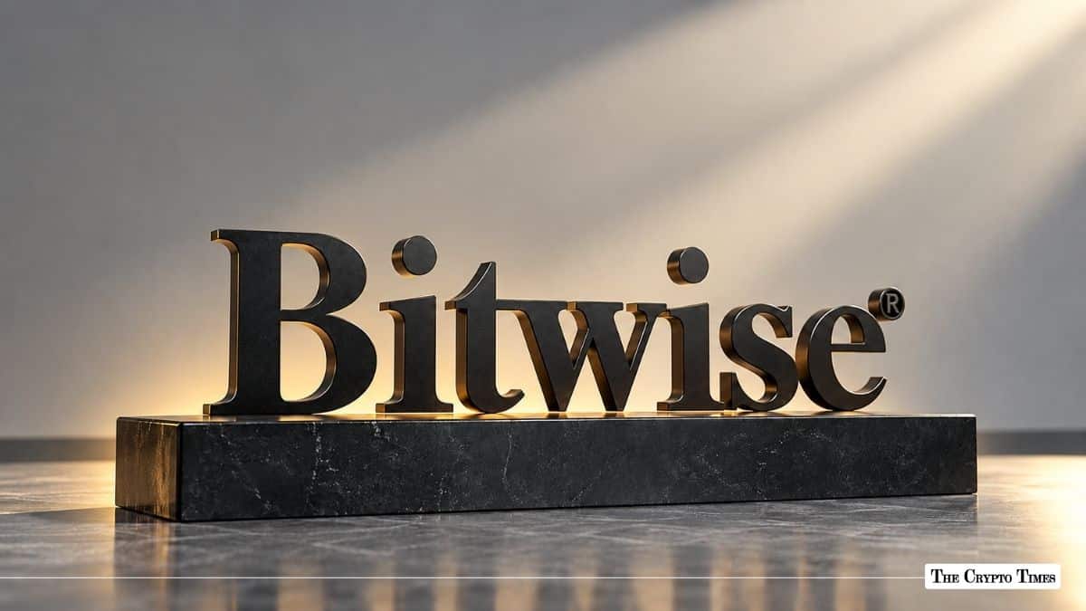 3D Bitwise corporate logo block illuminated on a marble base.