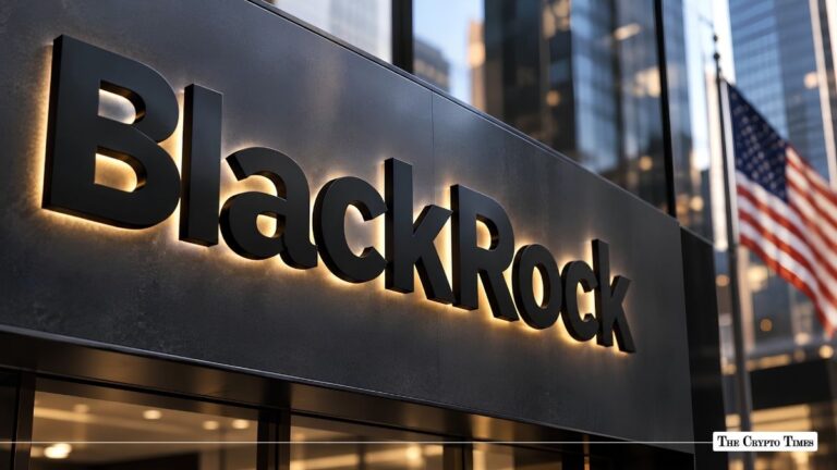 Illuminated BlackRock sign mounted on a building exterior with an American flag in the background.