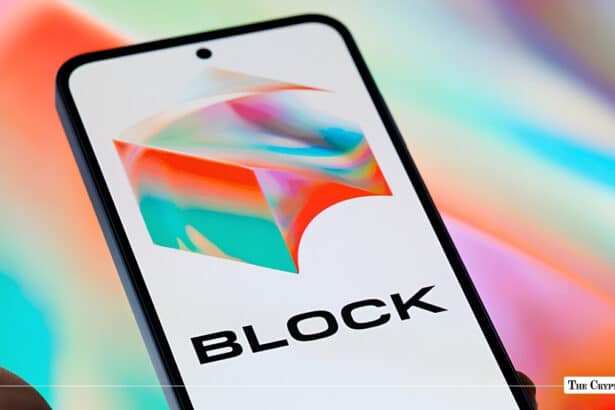 Smartphone screen displaying the Block company logo set against a colorful gradient background