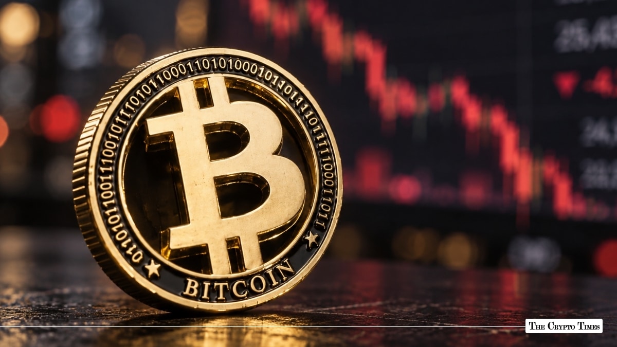 Gold physical Bitcoin coin positioned in front of a red stock market candle chart.