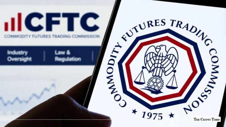 Hand holding smartphone displaying the CFTC seal in front of the Commodity Futures Trading Commission website.