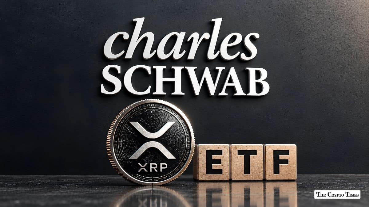 Silver XRP coin and "ETF" wooden blocks positioned in front of the Charles Schwab logo wall.