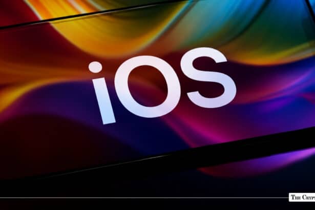 A smartphone displaying the iOS logo set against a colorful wavy background.