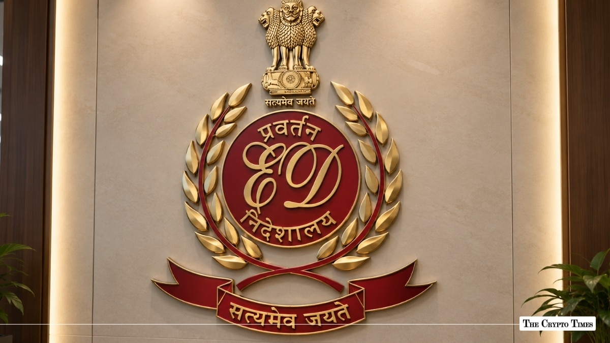 Enforcement Directorate emblem in gold and maroon mounted on a wall, with the Ashoka Lion Capital above it
