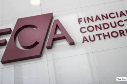 Financial Conduct Authority FCA logo mounted on a white wall