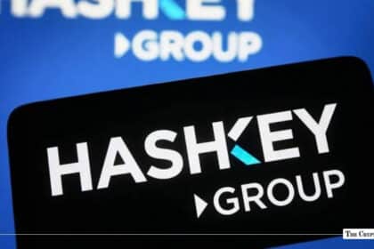 Smartphone screen showing the HashKey Group logo against a blue background displaying the same brand logo