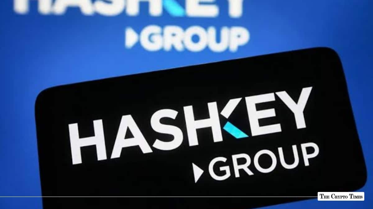 Smartphone screen showing the HashKey Group logo against a blue background displaying the same brand logo