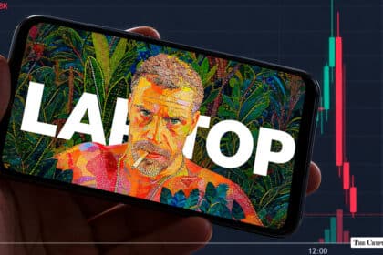 A hand holding a smartphone displaying stylized pop-art artwork of Hunter Biden with the word "LAPTOP" in front of a volatile red-and-green candlestick trading chart.