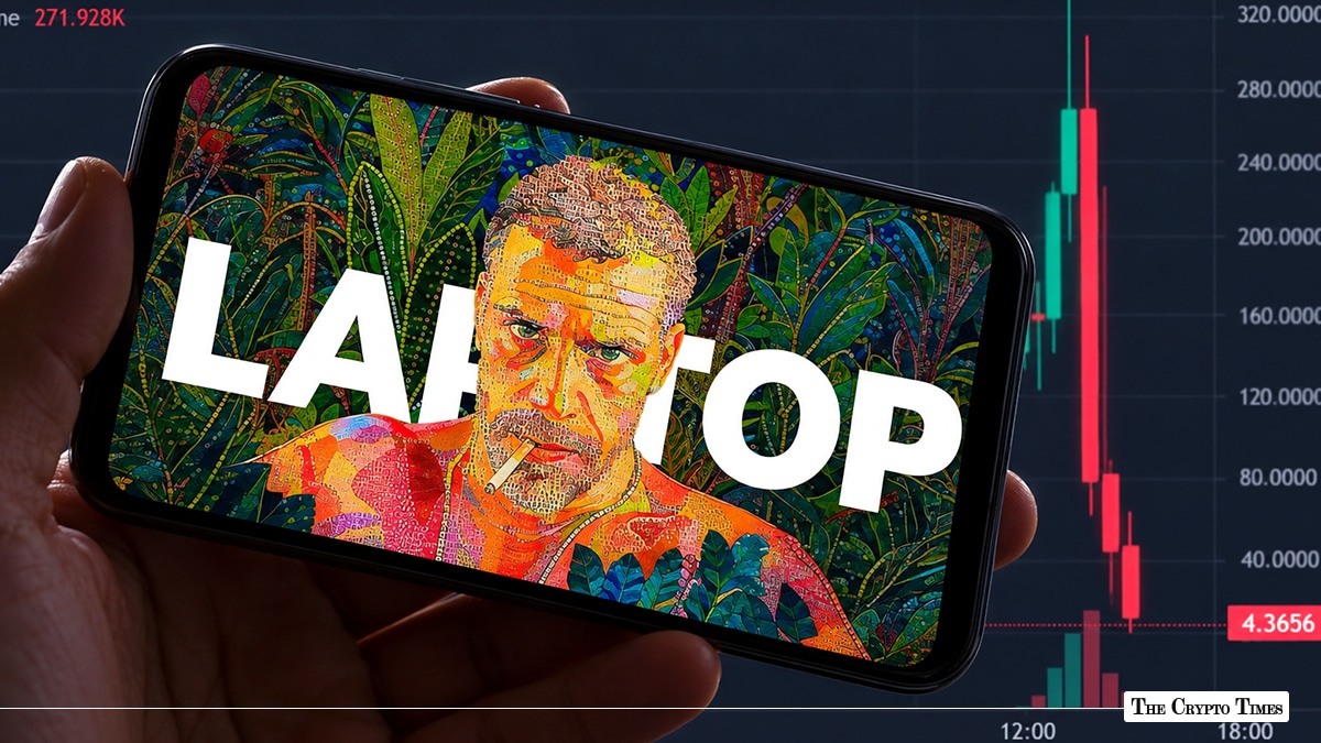 A hand holding a smartphone displaying stylized pop-art artwork of Hunter Biden with the word "LAPTOP" in front of a volatile red-and-green candlestick trading chart.