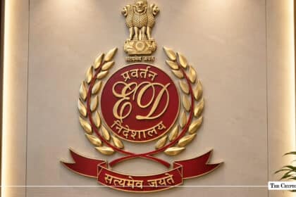 The official emblem of India's Directorate of Enforcement (ED) featuring golden laurel leaves and the State Emblem of India
