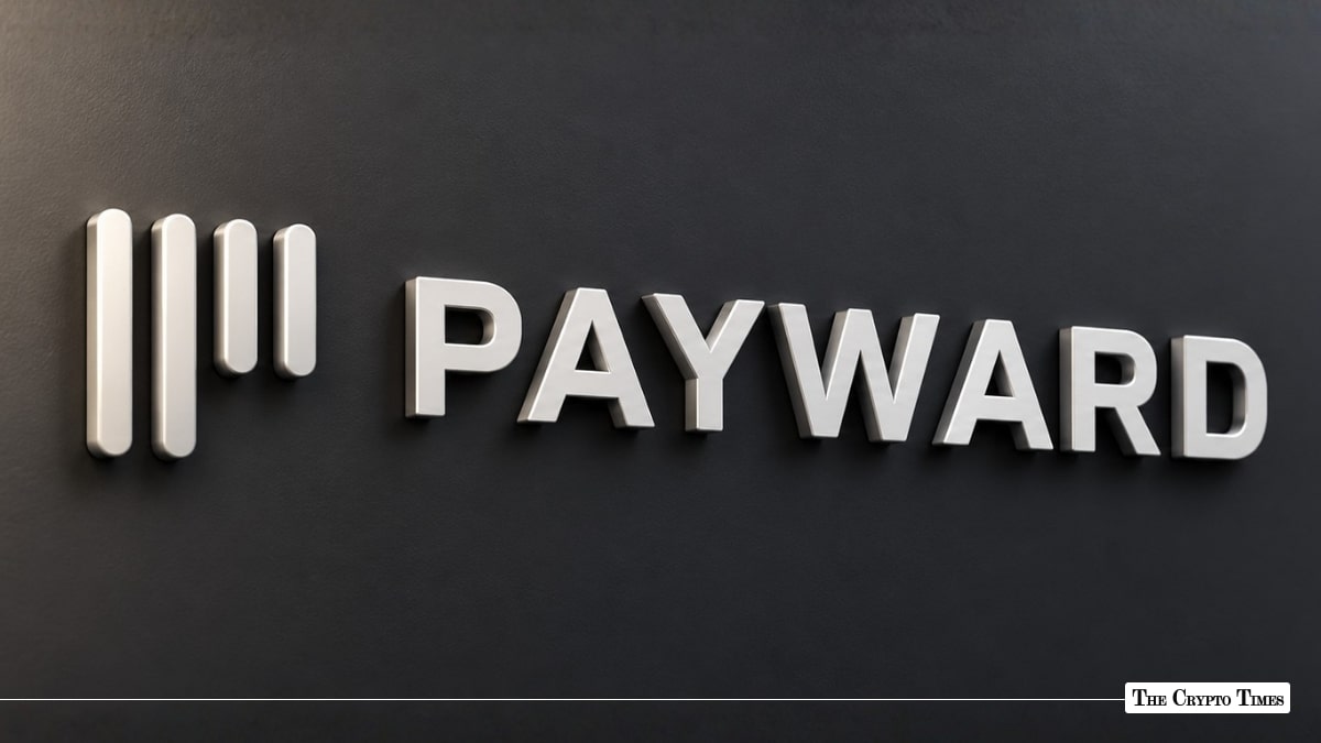 The silver Payward logo mounted on a dark wall.
