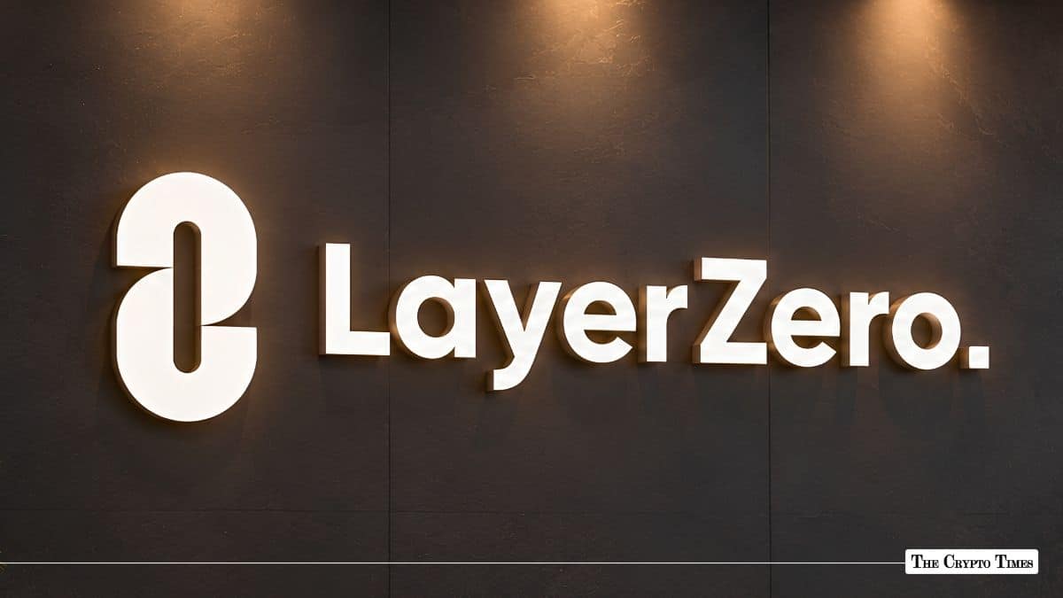 Illuminated LayerZero logo on a dark wall.