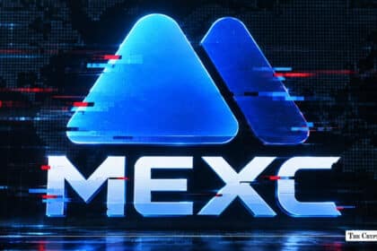 An illuminated blue MEXC logo with digital glitch effects on a dark background.
