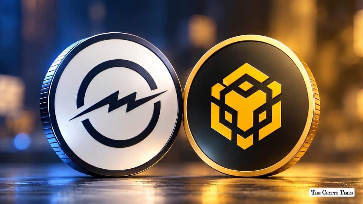Electroneum and BNB Chain cryptocurrency tokens side-by-side on a reflective surface.