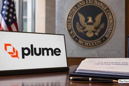 Plume logo on a display screen resting on a desk in front of the SEC seal.