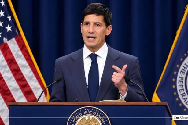 Federal Reserve official speaking at a podium during a press briefing.