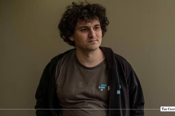 Sam Bankman-Fried in a brown t-shirt and black jacket.