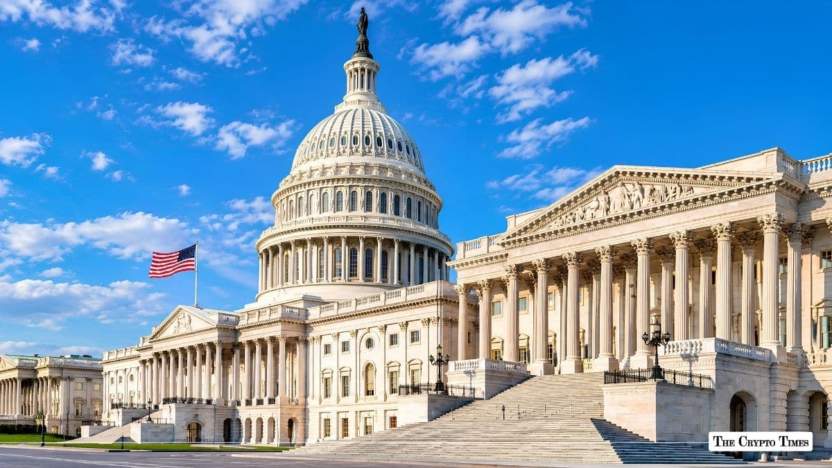 Exterior view of the United States Capitol building under a blue sky.