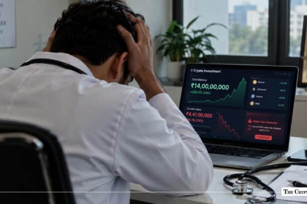 Stressed doctor holding head while looking at crypto portfolio losses on laptop screen