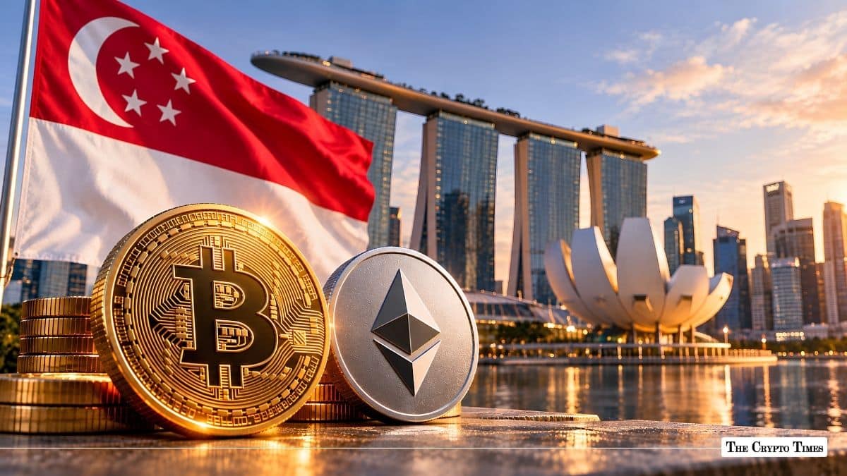 Physical Bitcoin and Ethereum coins with the Singapore flag and Marina Bay Sands skyline in the background.