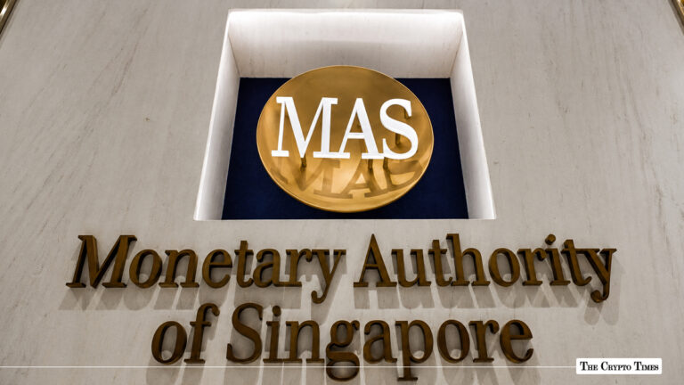 Gold-lettered building sign for the Monetary Authority of Singapore featuring the round MAS logo
