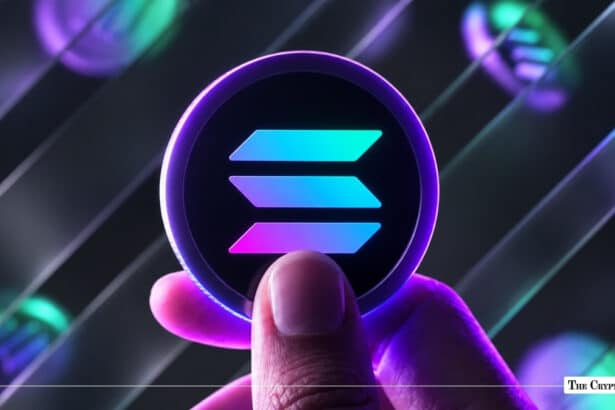 Hand holding a glowing purple 3D token displaying the cyan-and-pink Solana logo against a dark background with diagonal light tracks